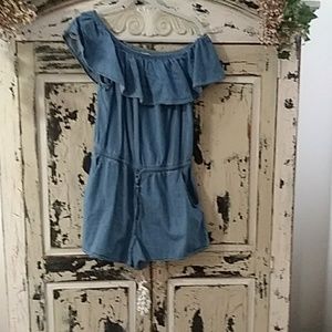 Blue jean romper with off the shoulder rufffle, po